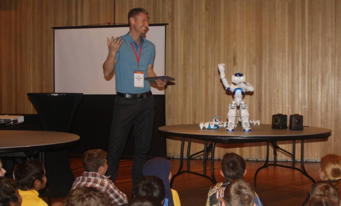 Robotics workshop with instructor Tyler Wellensiek from the State Library of Queensland, and an all-singing, all-dancing NAO robot. 