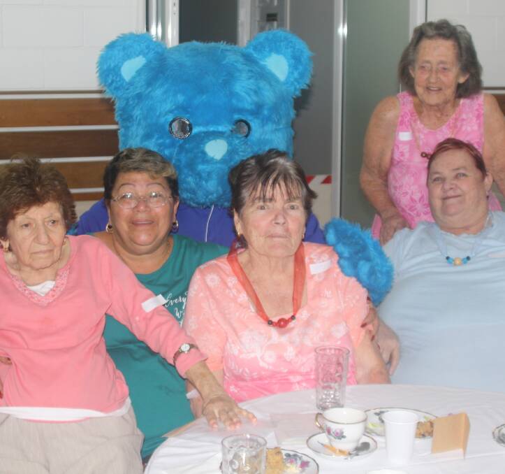 BLUEY BEAR: This brightly coloured bear joins seniors at Christian Outreach's morning tea. Photo: Esther MacIntyre