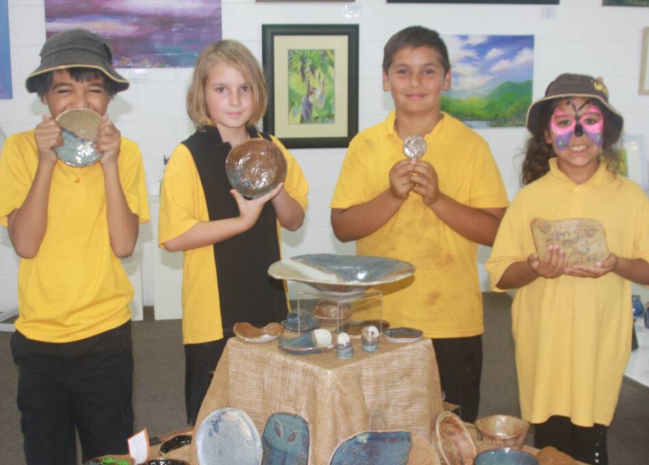 YOUNG POTTERS: Sunset State School students Harley Leicht (10), Reuben McDonald (9), Tre-Vaughn Terore (9), Launah Armstrong (8). Photo: Esther MacIntyre