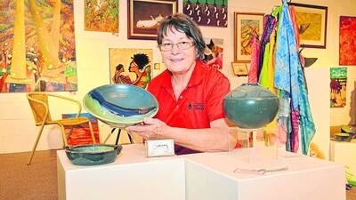 CLAY ART: Artist Michele Savoy with some of her work in the Potters Group gallery in Alma Street. Photo: Melissa North