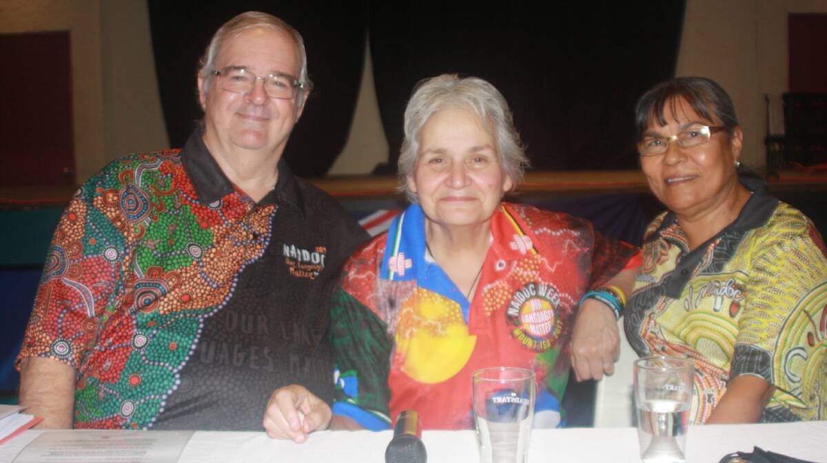 NOTHING TRIVIAL: Quiz master Terry Lees with wife Pattie Lees from Injilinji, and Valerie Craigie from MOB FM. Photo: Esther MacIntyre