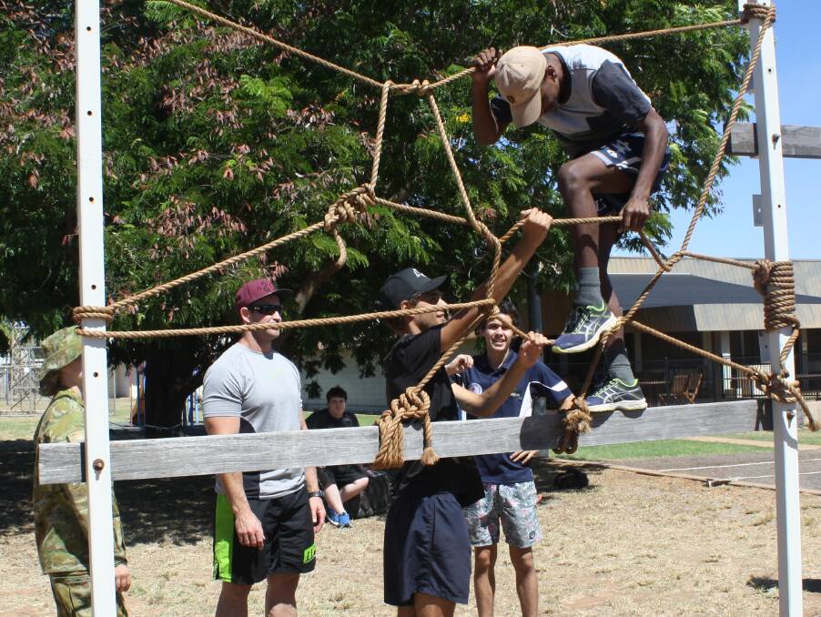 ROPE WEB: Five young men participated in the boot camp on Friday in Mount Isa. Photo: Esther MacIntyre 