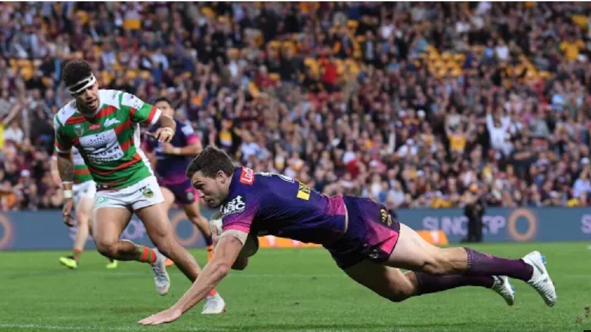 Triple treat: Broncos winger Corey Oates crosses for his third try. Photo: AAP