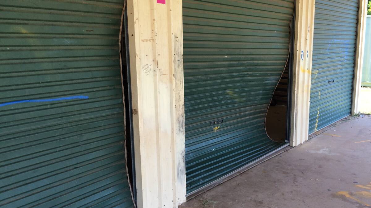 OLD DOORS: Ken Dickson said the old doors were flimsy like a coke can due to so many break ins. Photo: Supplied. 