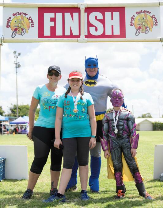 SUITED UP: The Moncreiff family made it to the finish line. Photo: Supplied
