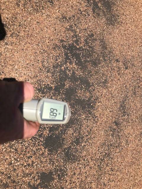 BLISTERING HOT: The temperature of the bitumen at Boulia on Tuesday at 2pm. Photos: Supplied