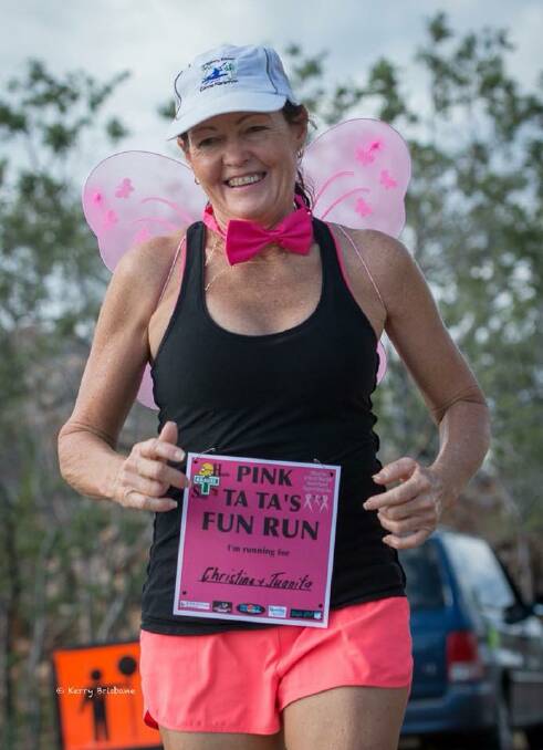 A runner dressed with pink wings advertises who she is running for at last years Pink TA TA event. Photos: Supplied