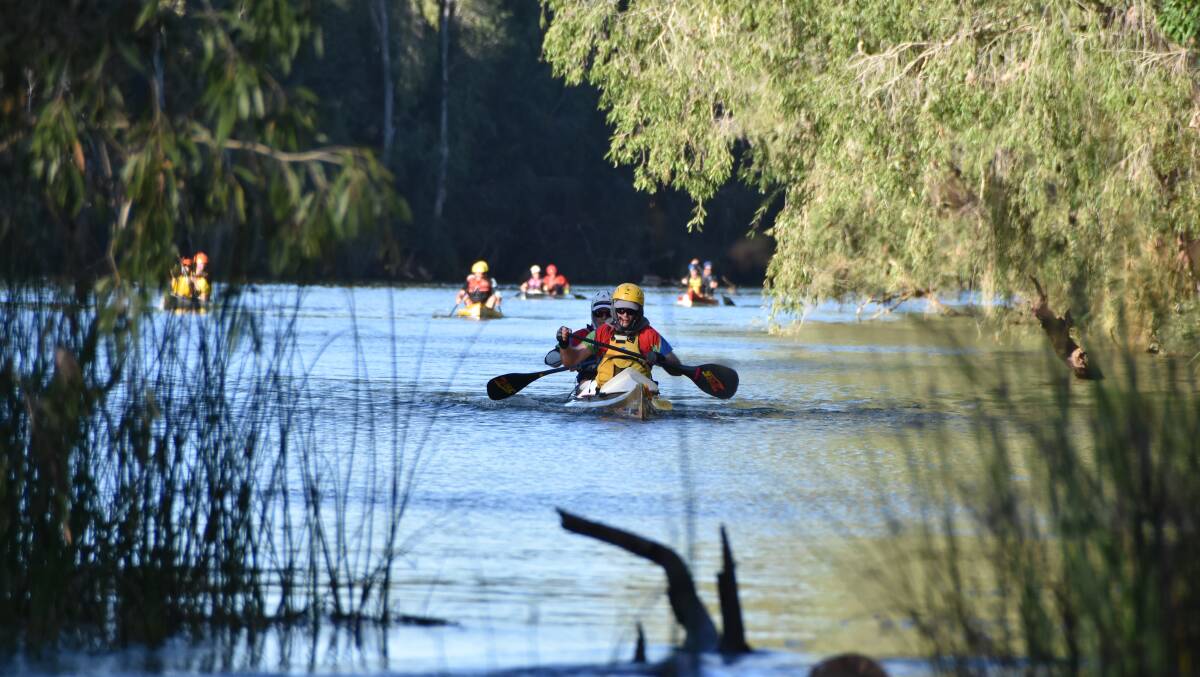 SADDLE AND PADDLE: There were paddlers for as far as the eye could see on Sunday morning at the annual canoe marathon on the Gregory river. Photos: Melissa North