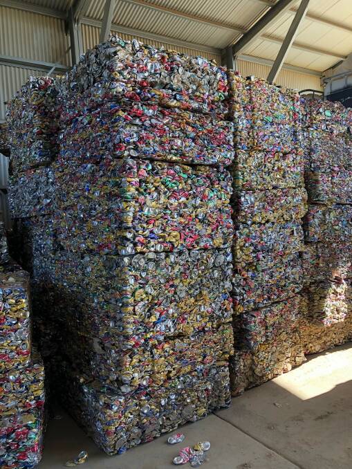 RECYCLE: Processed bales of aluminium cans.