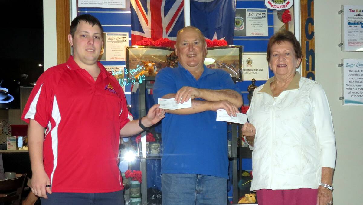Alexander Kollasch, Steve Wollaston and Joy Larchin are handed cheques from various proceeds from Anzac Day. Photos: Supplied
