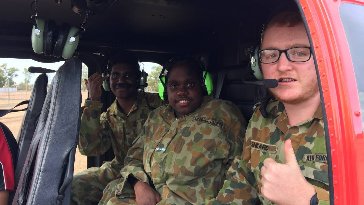 Cadets Mishmael Kelly, Gracelyn Doolan and Kevin Sheard gave a thumbs up for the flight.