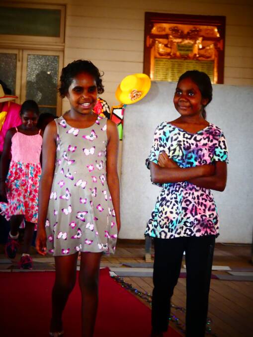 CAMOOWEAL CATWALK: These two aspiring models were showcasing the clothes from a local store. Photo: Supplied
