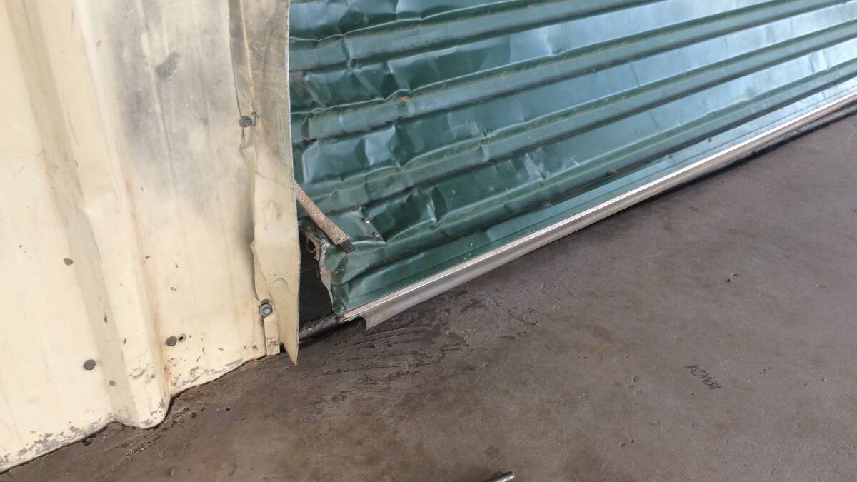 THE OLD DOORS: The old shed doors have been replaced with new cyclone proof doors to withstand being able to be pushed in. Photo: Supplied