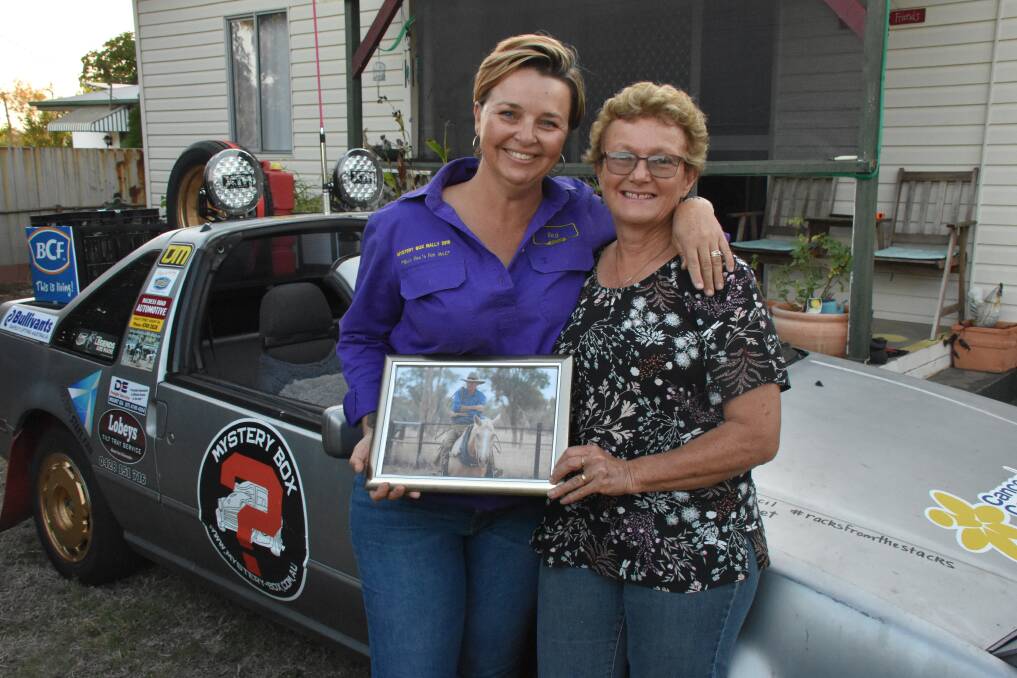 MYSTERY BOX RALLY: Rachel Wainwright and Liz Debney hold a picture of Mal Debney who will be honoured in the Rally on October 20. Photos: Melissa North