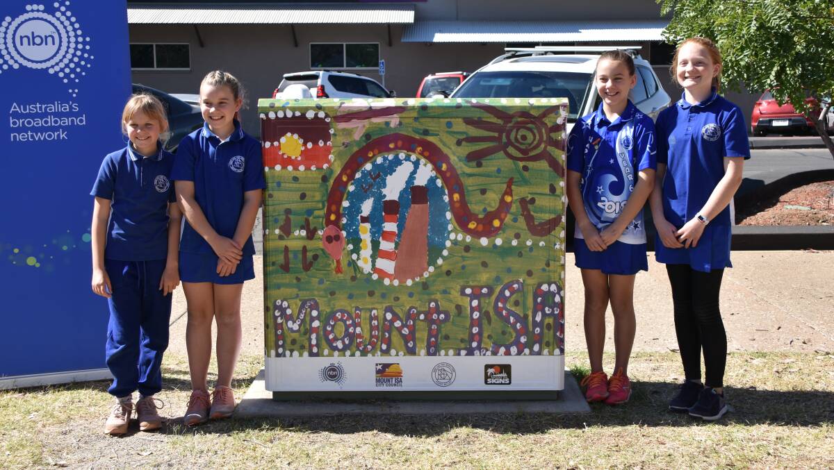 Four of the 13 students who participated in the art project to beautify the NBN node cabinets.
