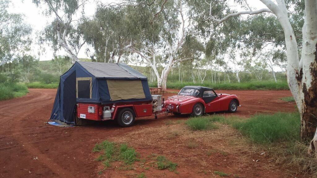 TRAVEL: Leonie Johnson and her husband travel in their sports car and home-made camper trailer. Photo: Supplied