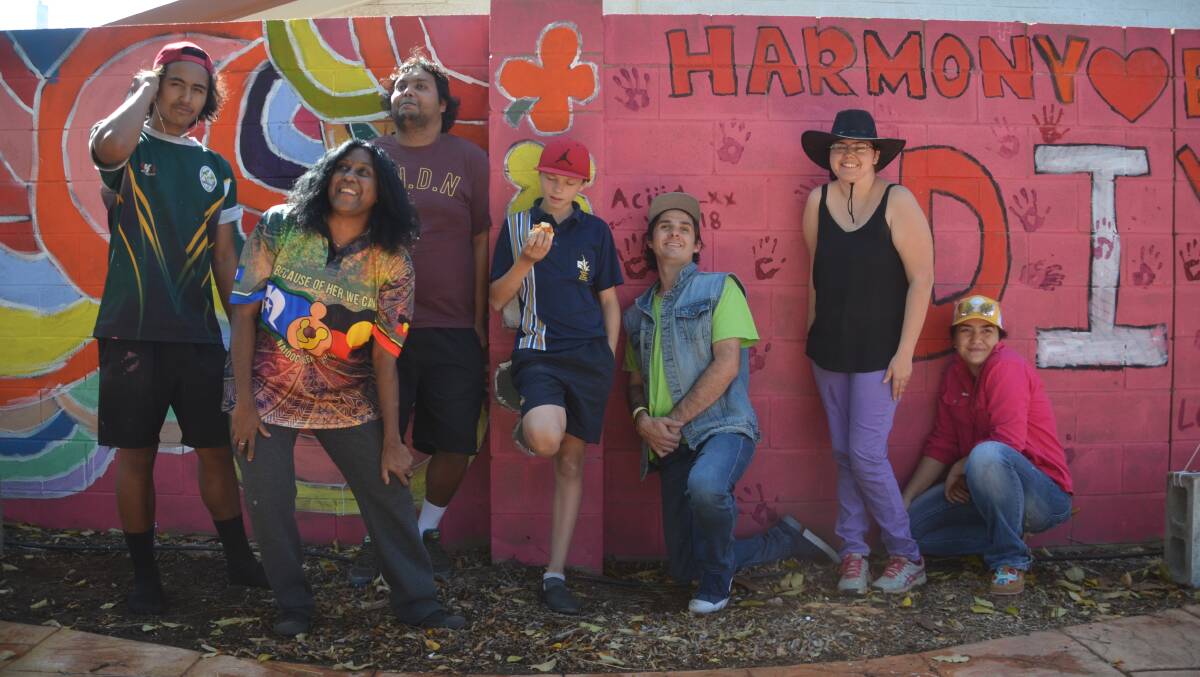 MURAL: The community diversity and harmony wall was unveiled last week at YPA Headquarters as guests left their handprints to as a symbol to reduce stigma and discrimination in Mount Isa. Photos: Melissa North