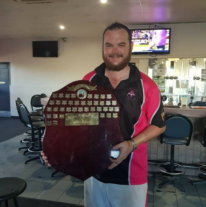 PANTHER PREMIERS: Matthew Birchley, affectionately nicknamed Hagrid, proudly displays the premiership trophy. Photo: Supplied