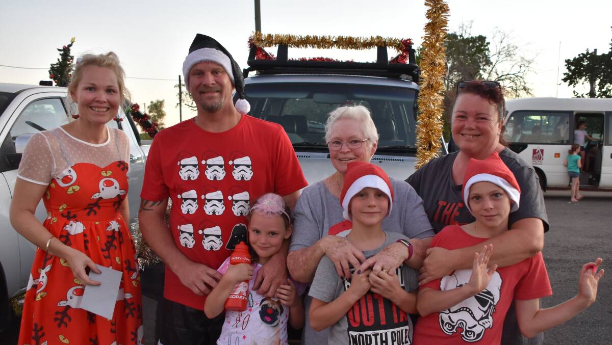 WINNERS: The Summers decked out the car with tinsel and other festive attire to win the Boss $100 gift card. Photos: Melissa North