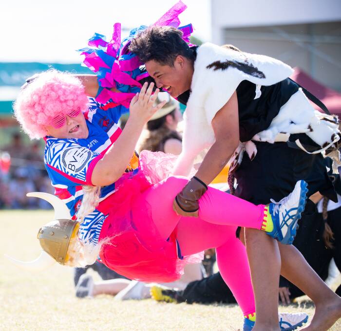 MISCHIEVOUS MASCOTS: Longreach and Bob’s Barbarians mascots tacklE each other at the Hughenden Rugby 7s last weekend.