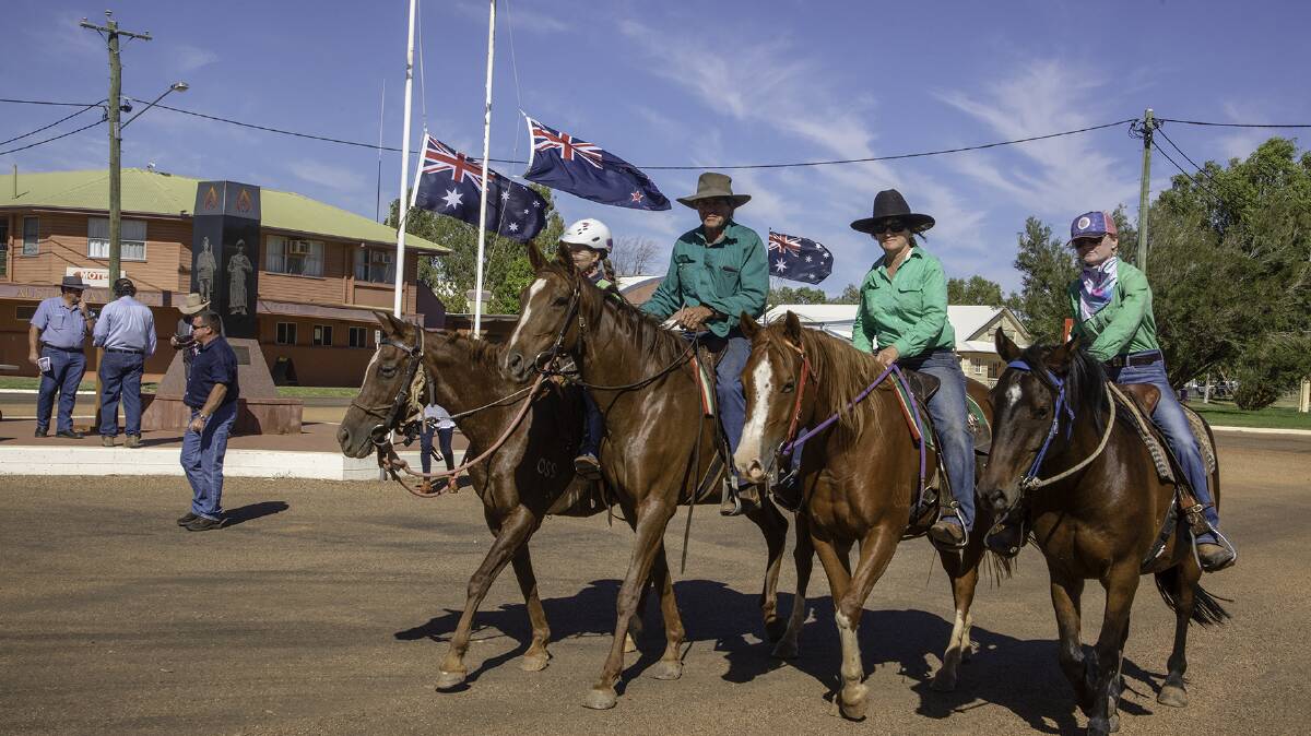 ANZAC DAY: Katie Saunders from Strathabliss riding Fox, Merv Burns from Fort William riding Penny, Kalinda Cluff and Kayla Cluff from Blair Athol. Kalinda riding Rio and Kayla riding Bronco