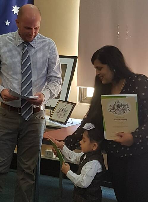 The Mayor of Cloncurry Greg Campbell handed Rajvir Singh Masuta his Australian citizenship certificate along with his mother's Mrs ranjit Kuar.