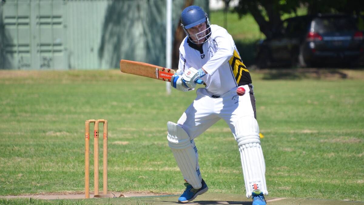 BLACKSTAR: A batsman concentrates on the ball as he takes his hit. 