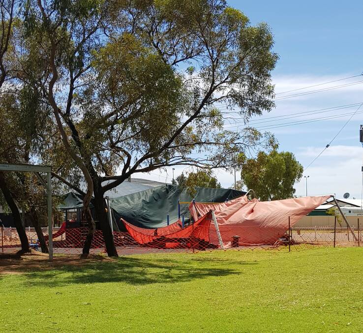 FREAK STORM: The Boulia State School shade structure toppled over during the freak weather. Photo: Supplied