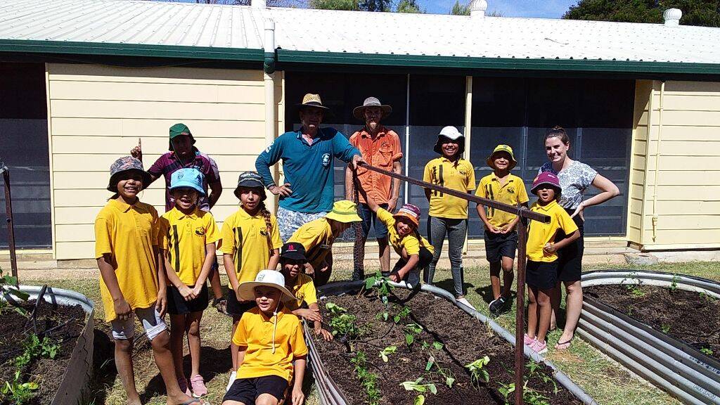 GARDEN BEDS: The senior class from Burketown State School and some members of the Gregory River Landcare group. Photo: Supplied
