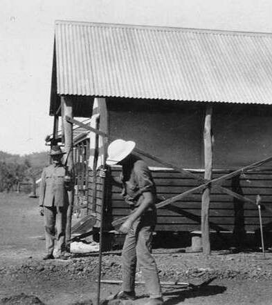 Getting set up: Constable Queale putting up his tent outside Mt Isa Police Station in 1929.