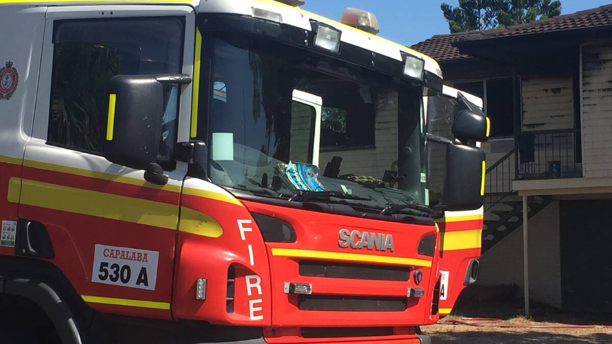 Woman taken to hospital after kitchen fire