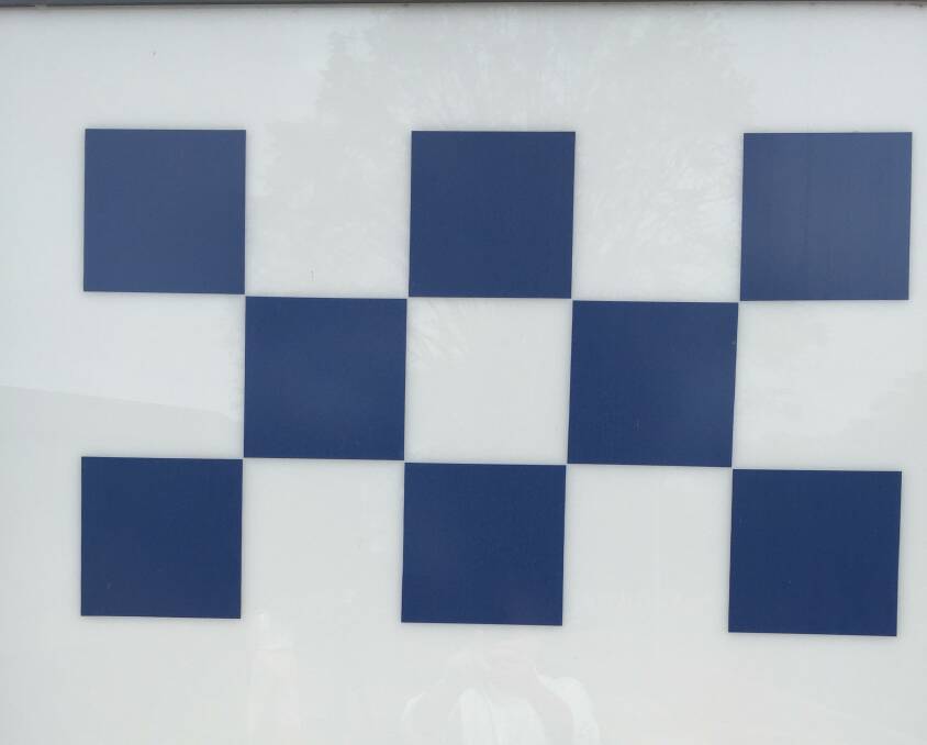 Mount Isa youth charged after spitting at police officer
