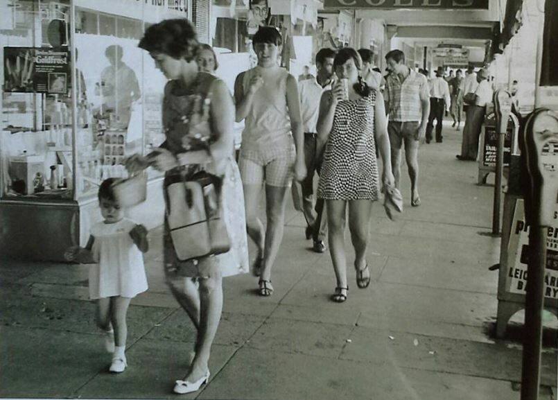 HIT THE SHOPS: Hemlines were starting to get high and Bermuda shorts were popular with teenagers as they strolled West St in the 1960s. 