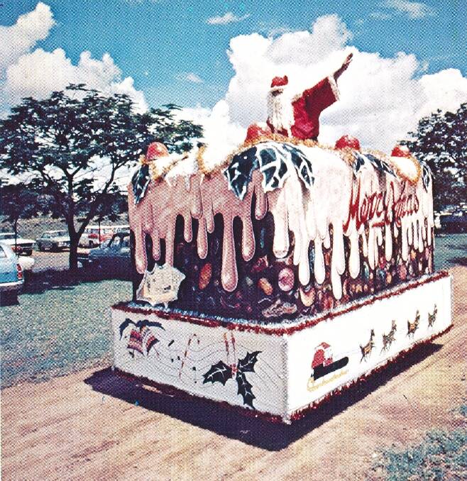 HO HO HO: Santa arriving in huge Christmas float for the 1976 Mount Isa Mines Christmas Tree Party. 
