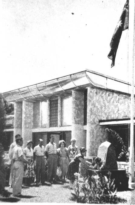 REMEBERANCE: Armistice Day at the Mount Isa Memoroal Swimming Pool cenotaph in 1955. 