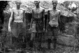 Three prisoners at Shimo Songkurai in 1943,the effects of malnutrition can be seen in their skeletal frames. Picture: courtsey of Tim Bowden.