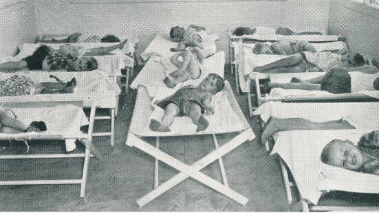 NAP TIME: Little angels catching some 40 winks in 1955 at Mount Isa day nursery. 