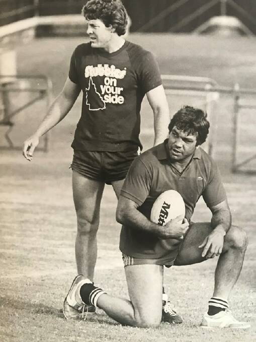 Gene Miles at training with Arthur Beetson.