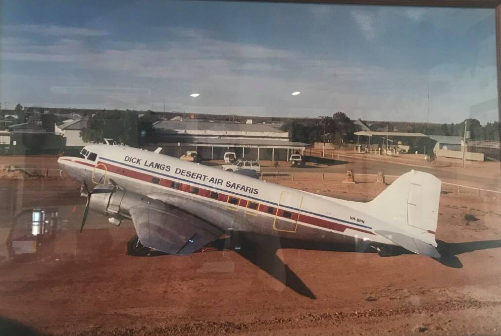 Dicks beloved DC3 parked in front of the Birdsville Hotel will now be a special reminder of a man that lived a life dedicated to sharing his passion of the outback with as many as he could. Photo supplied.