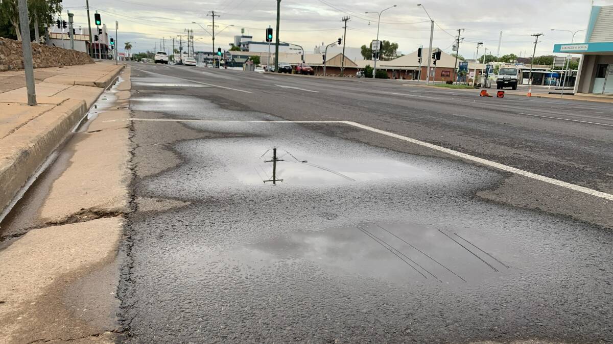 PUDDLES: Evidence of Tuesday night's showers line the streets and gutters this morning. Photo: Samantha Campbell.