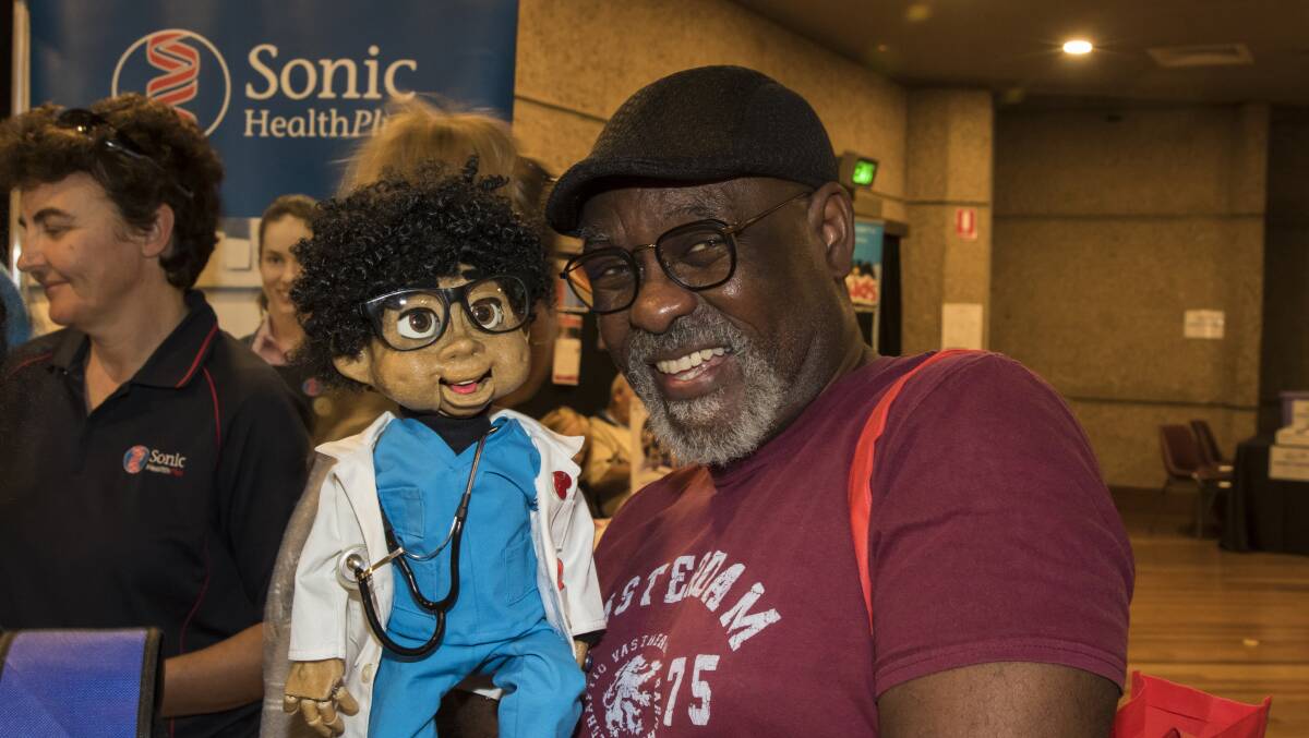 Puppeteer Louis Johnson with puppet Dr Kevin
