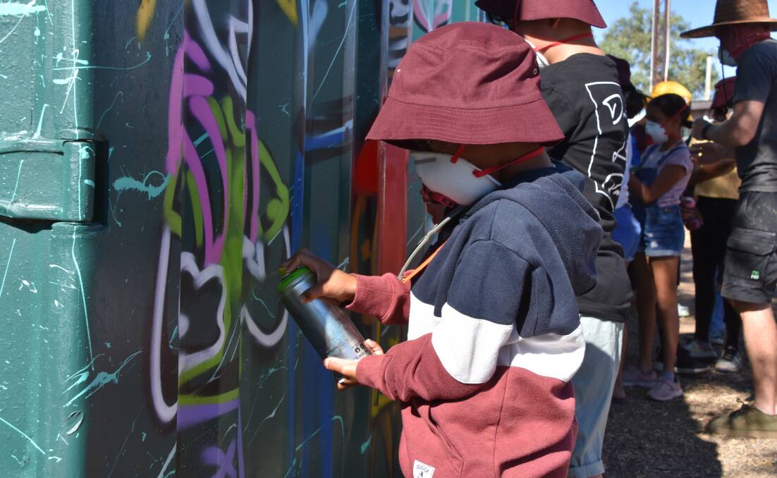 Students take part in the graffiti art workshop. Photo: Samantha Campbell.