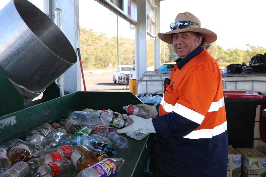 Waste Management Facility Truck Driver/Labourer Darren Perry counts recyclable plastic bottles at the facility's domestic transfer station. Photo supplied.
