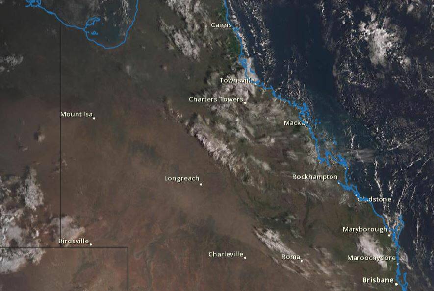 DUSTY: The slightly pink area from Roma to Mount Isa is the raised dust moving towards the Northern Territory. Photo: BOM satellite. 