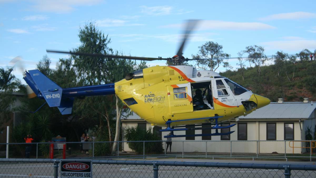 RESCUE: The RACQ Lifeflight BK 117 chopper lands at Mount Isa Hospital.