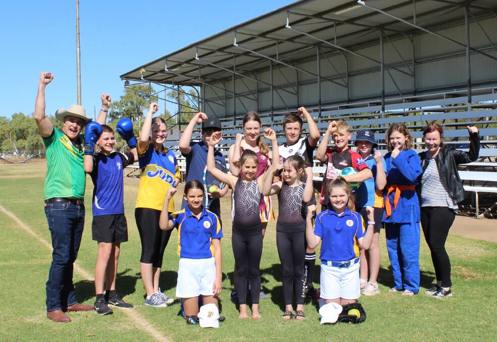 Robbie Katter with Mount Isa kids keen to get back to sport. Photo supplied.