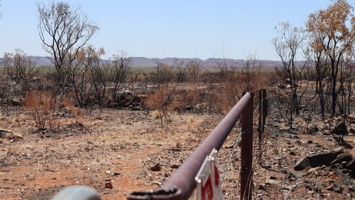 The fire has caused significant damage to the fence that runs adjacent to the Barkly Highway. Photo: Samantha Campbell.