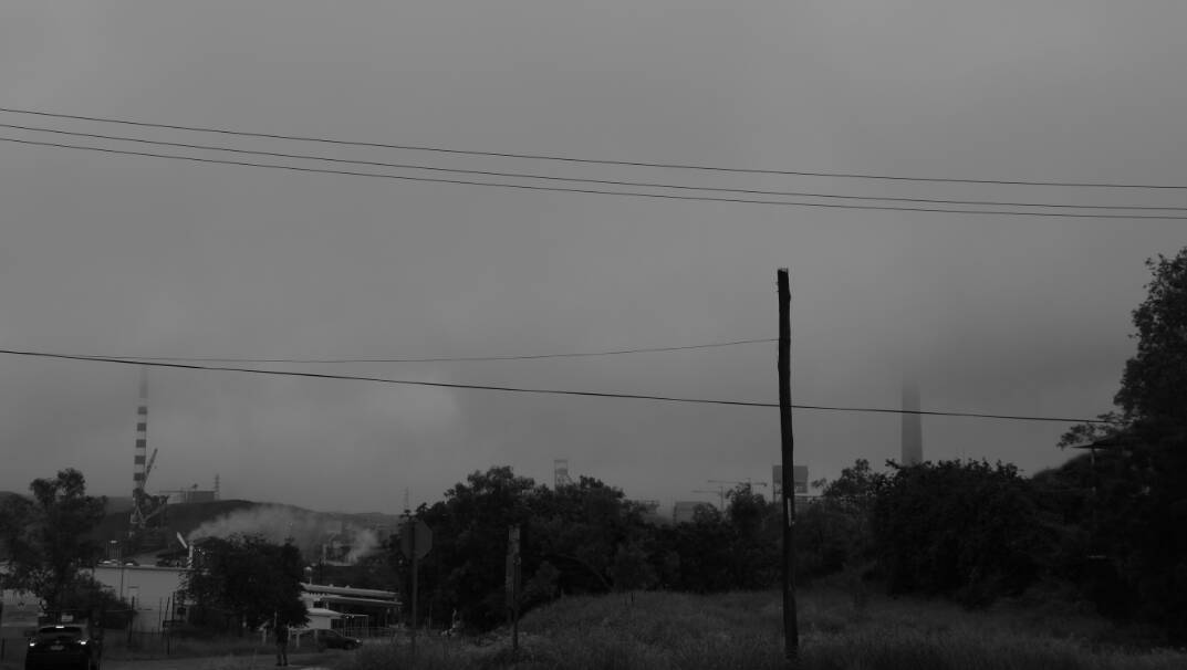 WET: Mount Isa is looking a bit misty this morning, following rain overnight. Photo: Derek Barry.