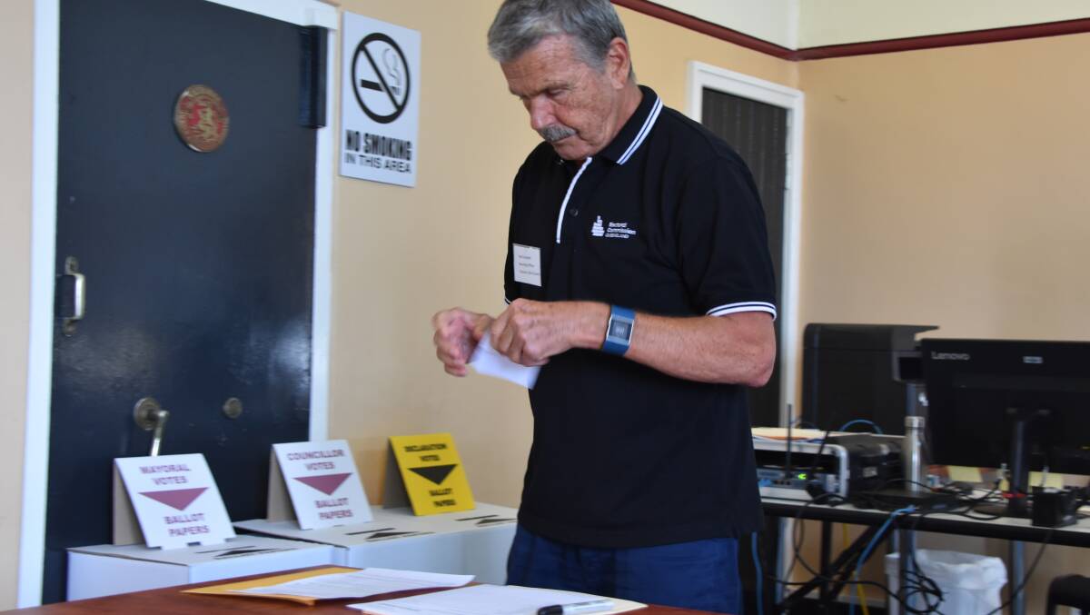 TOP SPOT: Returning officer Neil Campbell reads out Janessa Bidgood for number one on the ballot draw. Photo: Samantha Campbell