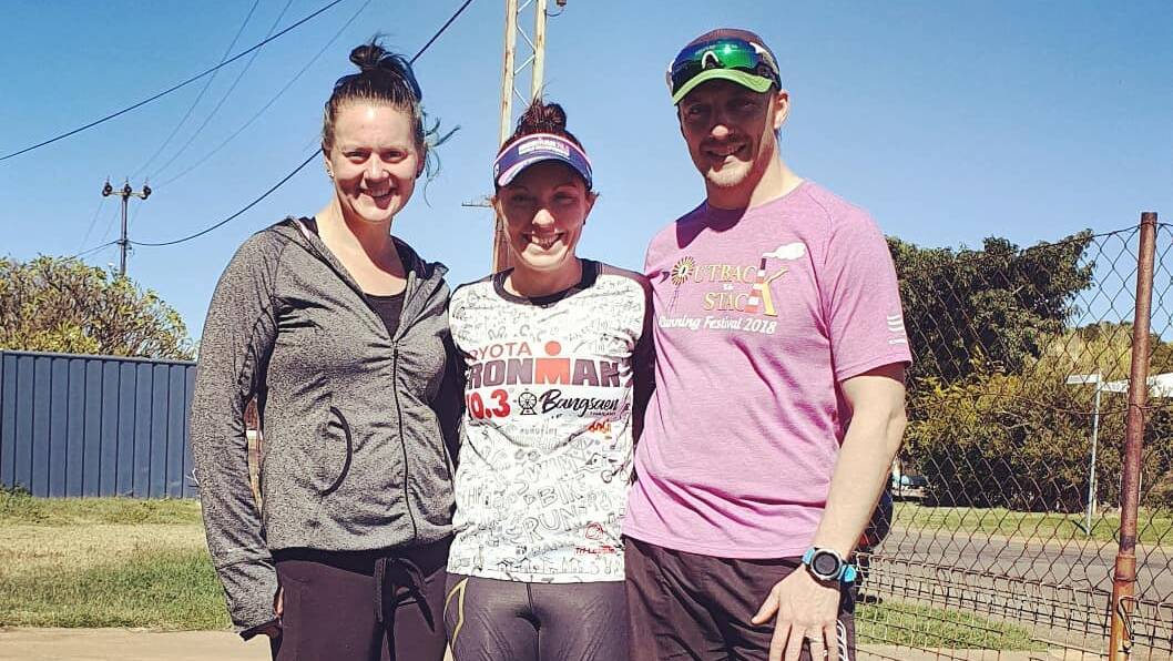 Kim Alcorn (middle) with her support runners, husband Ben and friend Danae. Photo supplied.